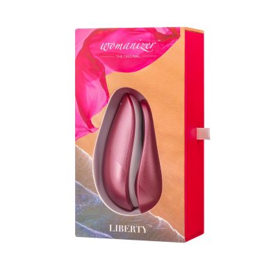 Вакуумний кліторальний стимулятор Womanizer Liberty Pink, магнітна кришка, 2 насадки Вакуумний кліторальний стимулятор Womanizer Liberty Pink, магнітна кришка, 2 насадки